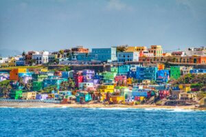 Image of the bright colorful houses lining the shores of Puerto Rico